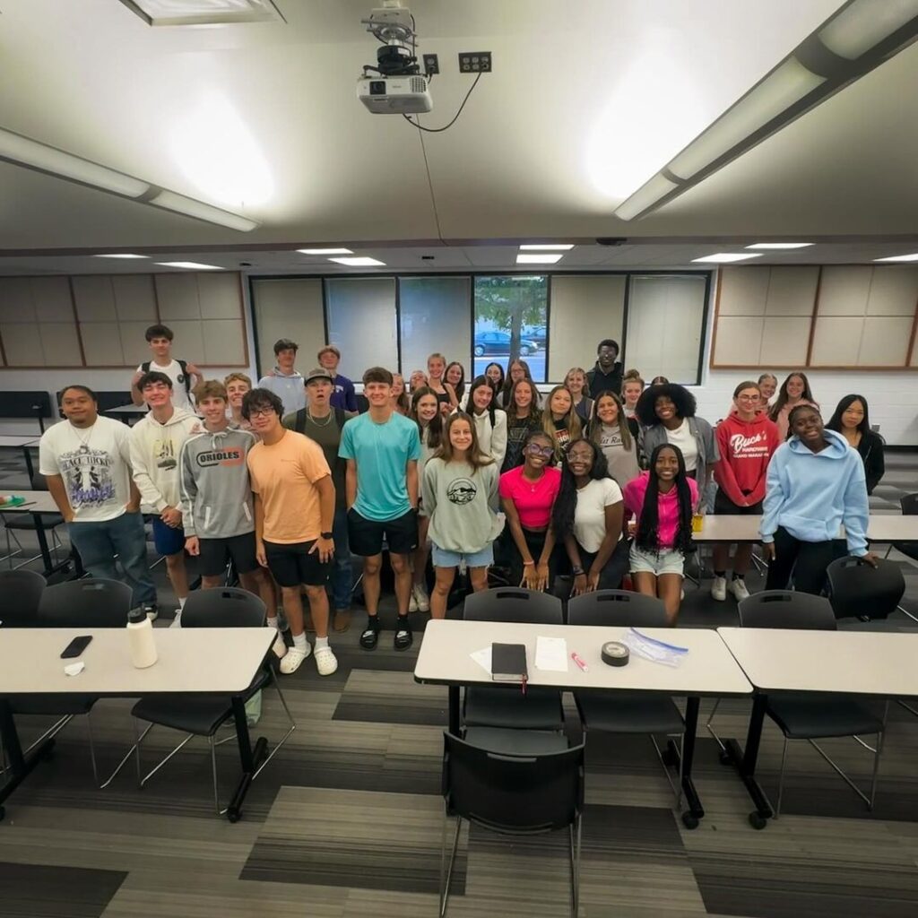 Students at Bibles & Breakfast, a Wednesday morning Bible study at Osseo High School