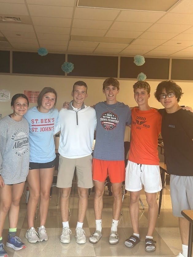 Students from the Fellowship of Christian Athletes group at Osseo High School