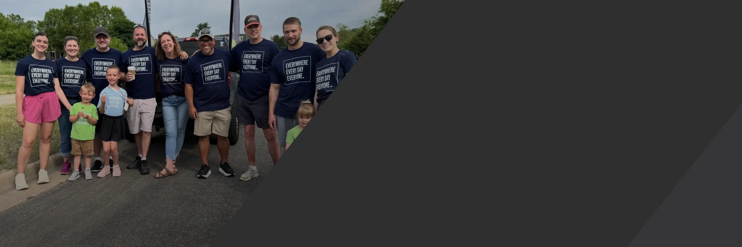 Clarity Church serve team in matching Everywhere, Every Day, Everyone shirts, serving the Brooklyn Park community