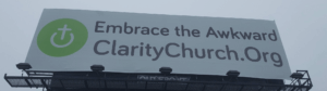 Clarity Church billboard reading Embrace the Awkward, ClarityChurch.Org